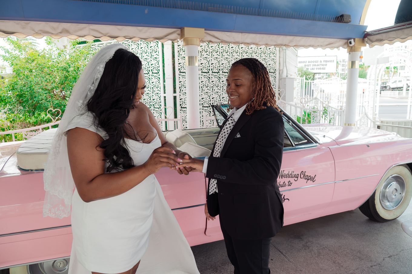 Exchanging rings, both smiling