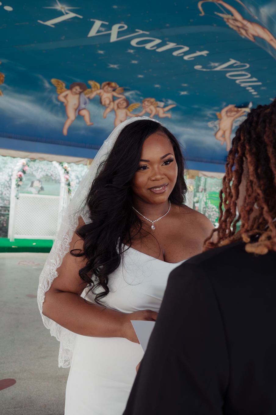 Bride portrait under the painted chapel sky
