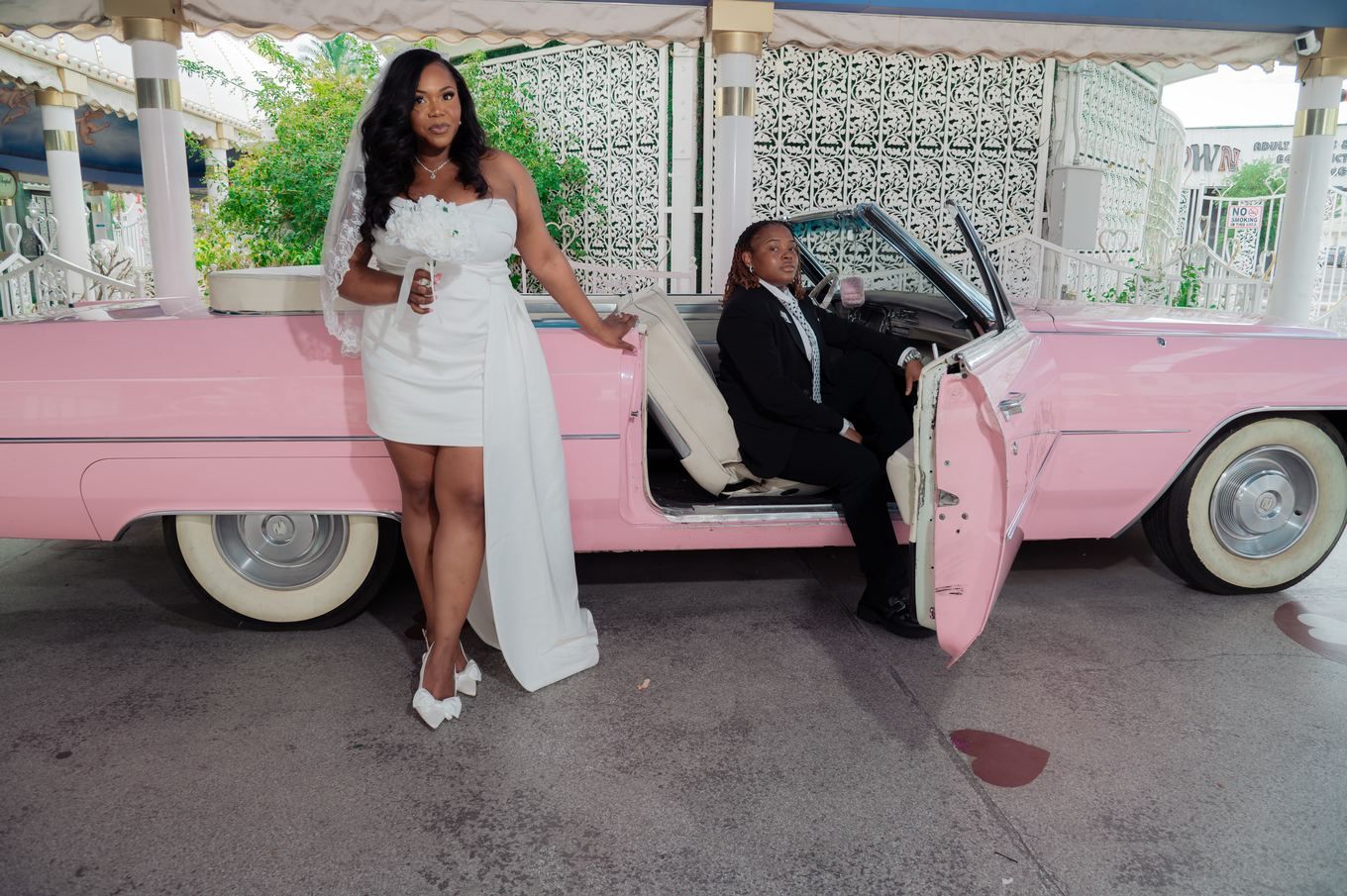 Editorial portrait with the vintage pink Cadillac