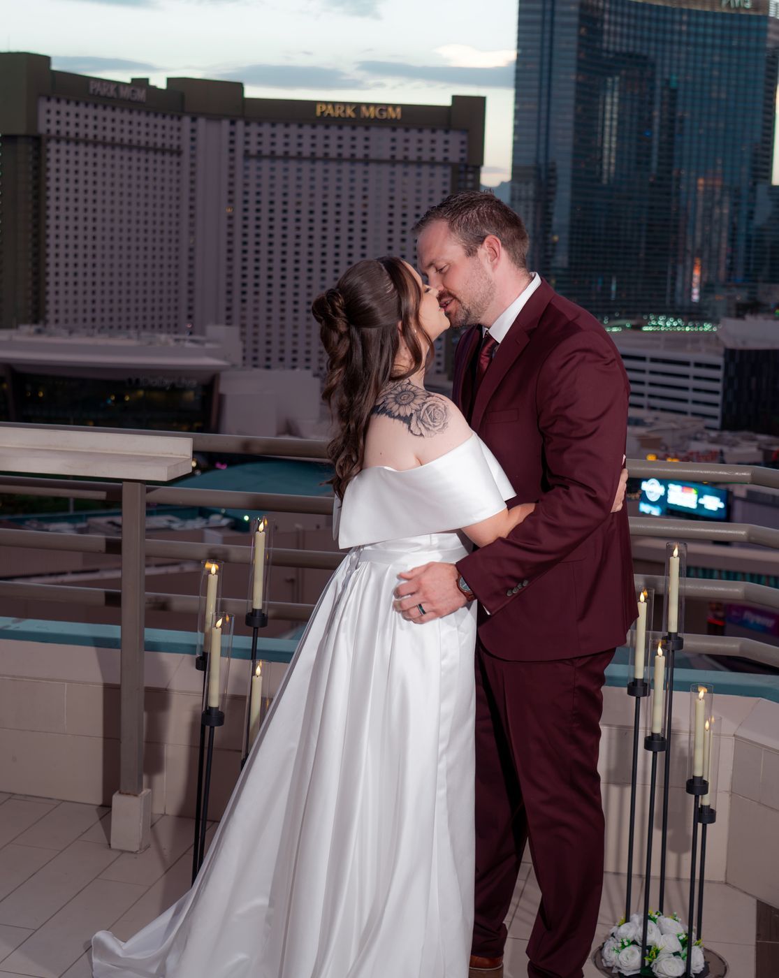 Candlelit kiss on the rooftop terrace