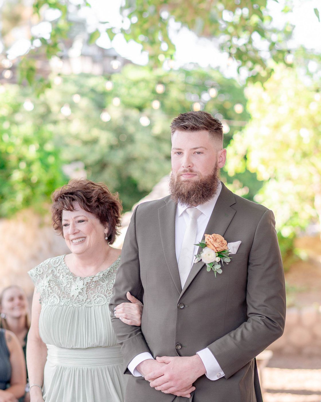 Groom escorted in before the ceremony