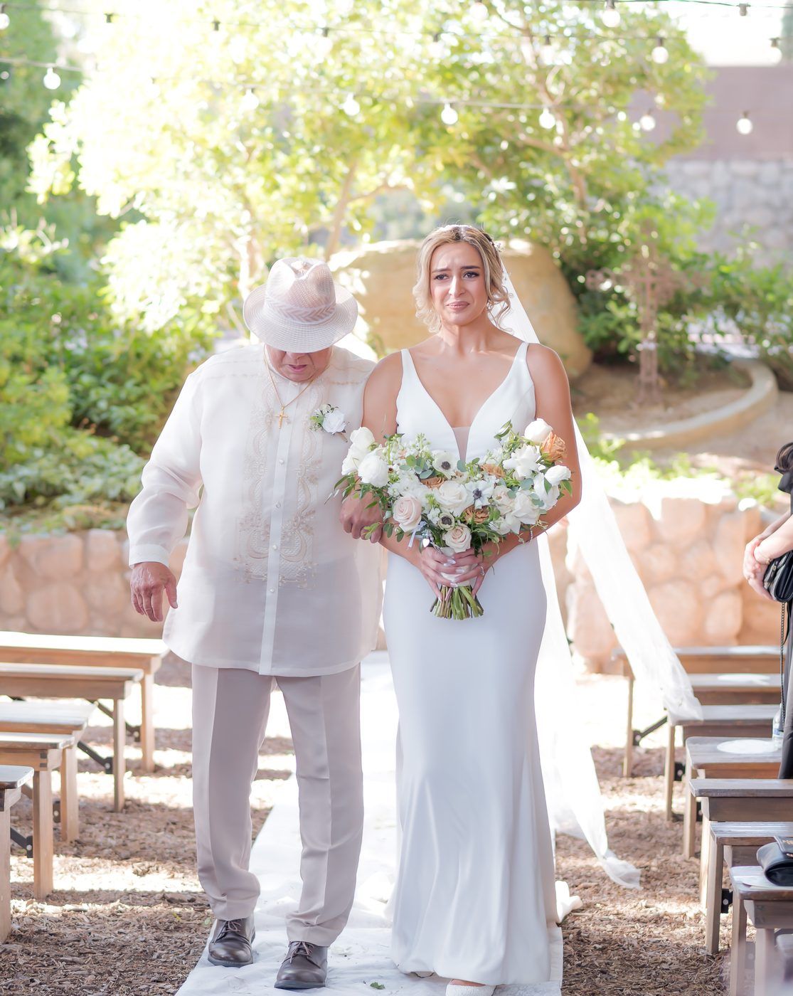 Bride walking down the aisle with her father